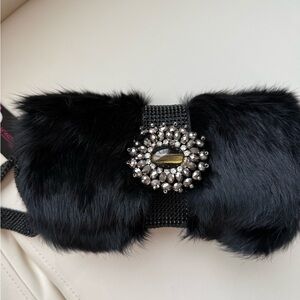 Elegant Black Fur Clutch with Gemstone Accent